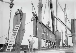 Construction Site Prints: Putting 46 ton girder in place - Cons. Gas Co's Bldg. 1913. Creator: Bain News Service