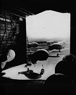 Putting barrage ballons into a hangar, 1943