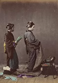 Dressing Gallery: Putting on the Obi or Girdle, 1868. Creator: Felice Beato