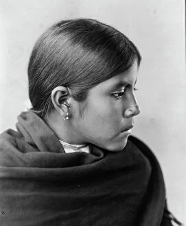 Earring Collection: Qahatika girl, c1907. Creator: Edward Sheriff Curtis