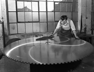 Circular Saw Gallery: Quality checking a giant saw blade, Edgar Allens steel foundry, Sheffield, South Yorkshire, 1963