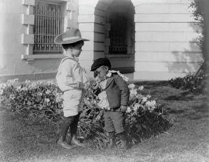 Quentin Roosevelt I Prints: Quentin Roosevelt as a child in front of a flower garden