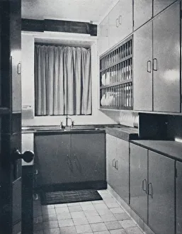 R. W. Symonds and Partner, L. & A. R. I. B. A. - Kitchen: Putty-coloured cellulosed fiitments