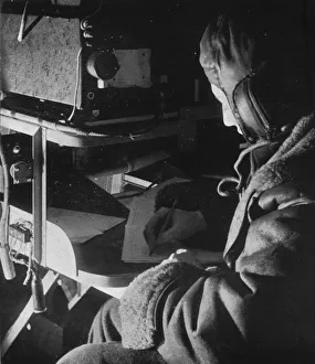RAF Coastal Command radio operator on board his aircraft, c1940 (1943) RAF Coastal Command radio operator on board his aircraft, c1940 (1943)