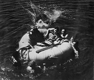 Rubber Collection: RAF personnel learning to use a dinghy, 1941. Creator: Charles Brown
