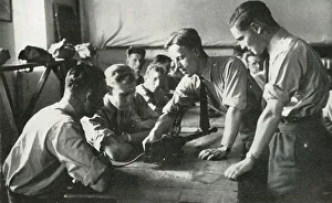 RAF personnel learning about weapons, 1941. Creator: Charles Brown RAF personnel learning about weapons, 1941. Creator: Charles Brown