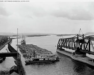 Drawbridge Prints: Raft passing drawbridge, Winona, Minn. between 1880 and 1899. Creator: Unknown