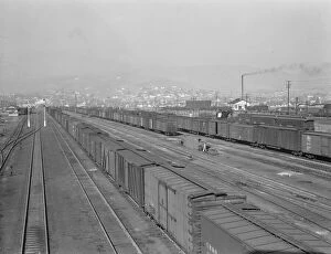 Railroad yard, outskirts of fast-growing town, Klamath Falls, Oregon, 1939. Creator: Dorothea Lange