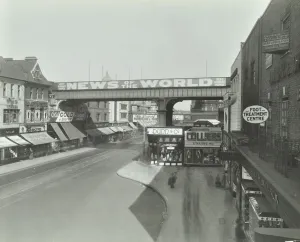 Council Prints: Railway bridge and advertising over the Brixton Road, Lambeth, London, 1938