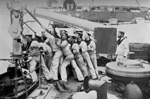 Raising Gallery: Raising the anchor on the forecastle of the battleship HMS Majestic, 1896Artist: Gregory & Co