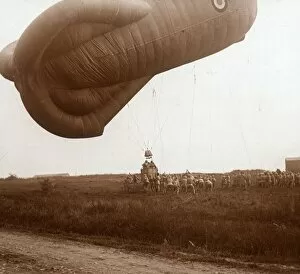 Raising Gallery: Raising of barrage balloon with basket for observation, c1914-c1918
