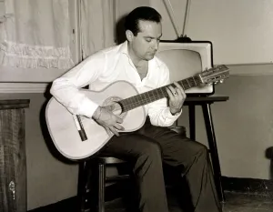1967 Prints: Ramon Calduch, Spanish singer playing guitar at home, 1967