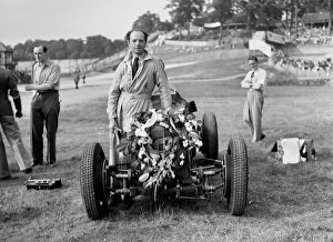 Mays Gallery: Raymond Mays with his ERA at Brooklands, Surrey, 1936. Artist: Bill Brunell