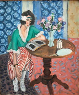 Stripes Prints: Reading woman at the table, 1921. Creator: Henri Matisse