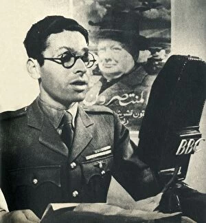 Booklet Gallery: He reads the news in Moroccan Arabic. A member of the Fighting French Army, 1942