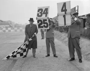 Finishing Line Prints: Ready to wave the chequerd flag, Brooklands. Artist: Bill Brunell