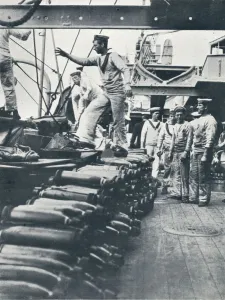 Receiving shells for the naval guns on the deck of a battleship, c1914 Receiving shells for the naval guns on the deck of a battleship, c1914