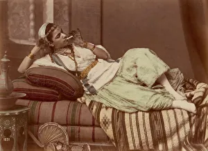 Chaise Longue Prints: Reclining Woman Smoking, 1870-90. Creator: Unknown