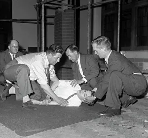 First Aid Prints: Recovery position, East Midland Gas Board training, 1961. Artist: Michael Walters