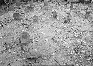 Rain Collection: A red clay Negro cemetery, Bethel Hill High School, Person County, North Carolina, 1939