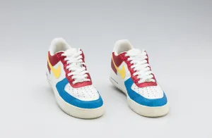 Brand Prints: Red, white, yellow, and blue Nike sneakers worn by Big Boi of Outkast, 2005-2006