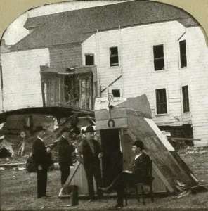 Refugee Camp Gallery: Refugees camp, former dwelling in ruins in background. This is earthquake work, 1906