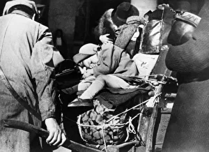 Refugees with their luggage at the Gare de l Est, Paris, August 1940