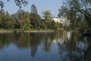 Regents Park - Reflections of the gardens and Bedford College, London, NW1, England