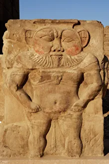 Relief of the god Bes, capital of column, Temple of Hathor, Dendera, Egypt, 2003. Creator: LTL