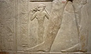Relief of legs of Mereruka with his wife Watetkhethor... Mastaba of Mereruka, Egypt, 2003. Creator: Unknown