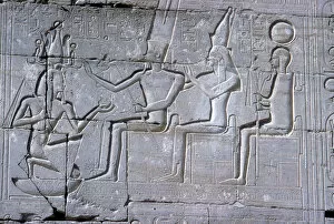 Relief of Rameses II kneeling before Amun Mut & Khons, The Ramesseum, Luxor, Egypt, c1250 BC