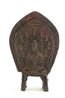 Relief statuette of seated Buddha with nine miniature Buddhas Relief statuette of seated Buddha with nine miniature Buddhas