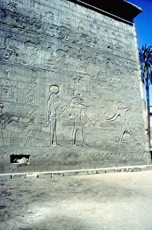 Roman Period Prints: Reliefs of Pharaoh smiting enemies, The first Pylon, Temple of Khnum, Esna, Egypt