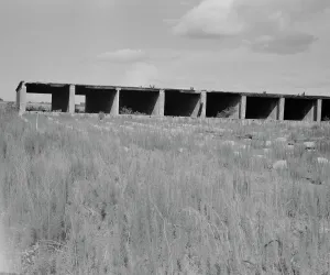 Lumber Yard Prints: Remains of dry kiln shed, Fullerton, Louisiana, 1937. Creator: Dorothea Lange