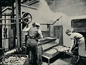 Archibald Williams Gallery: Removing Biscuits from Oven, c1917