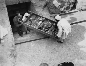 Grave Goods Collection: Removing a tray of chariot parts from the Tomb of Tutankhamun, Valley of the Kings, Egypt, 1922