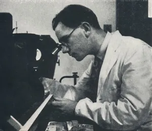 Aluminium Prints: Research worker with microscope (testing the structure of an aluminium alloy)