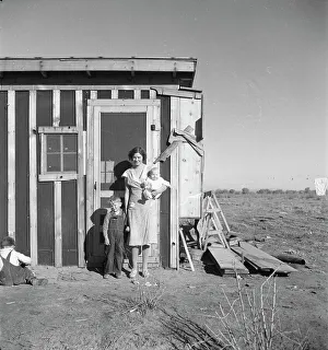 Resettlement Prints: Resettled at Bosque Farms project - family of four from Taos Junction