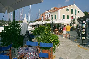 Ionian Islands Prints: Restaurant on the waterfront in Fiskardo harbour, Kefalonia, Greece