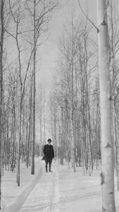 Trail Prints: Rev. Burgess on snow covered road, between c1900 and 1927. Creator: Unknown
