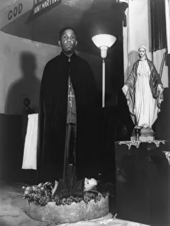 Reverend Vondell Gassaway, pastor of the St. Martins Spiritual Church... Washington, D.C. 1942. Creator: Gordon Parks