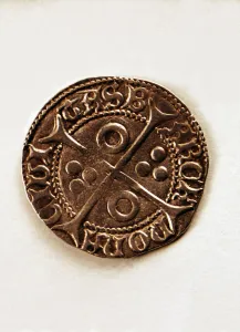 Reverse of a coin of one-cruzado in silver, from the reign of Ferdinand I of Antequera Reverse of a coin of one-cruzado in silver, from the reign of Ferdinand I of Antequera