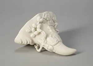 Dehua Ware Blanc De Chine Collection: Rhinocerous Horn-Shaped Cup with Figures by a Tree, Ming dynasty (1368-1644)