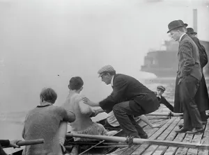 Adjusting Prints: Rice, coach of Columbia Varsity crew team instructing, 1910. Creator: Bain News Service