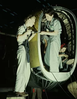 Us Navy Gallery: Riveters at work on fuselage of Liberator... Consolidated Aircraft Corp. Fort Worth, Texas, 1942