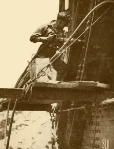 Golding Prints: A Riveting Hammer in Operation on the Sydney Harbour Bridge, c1930. Creator: Unknown