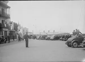 White Star Line Gallery: RMS Queen Mary passing Cowes, Isle of Wight, August 1936. Creator: Kirk & Sons of Cowes