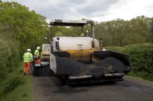 Repairs Prints: Road resurfacing work repairing potholes
