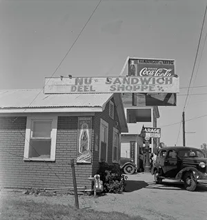 Garage Prints: Roadside stand and filling station near Ennis, Texas, 1937. Creator: Dorothea Lange