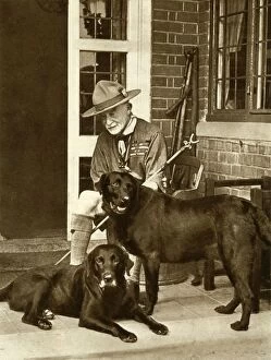 Odhams Press Ltd Gallery: Robert Baden-Powell at home with his dogs, c1929, (1935). Creator: Unknown